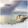 slides/Passing Snow Storm over Beachy Head.jpg sussex coast,east,west,chalk,beachy head,lighthouse,winter,snow,water,sunset,clouds,cold,storm,sussex landscape photography by simon parsons,cliff top,landscape in snow Passing Snow Storm over Beachy Head